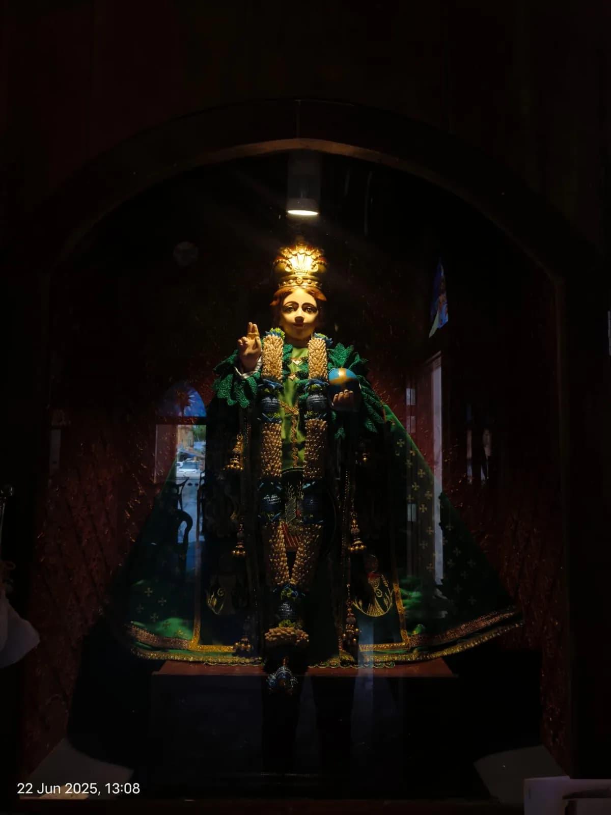 The Miraculous Statue illuminated at night