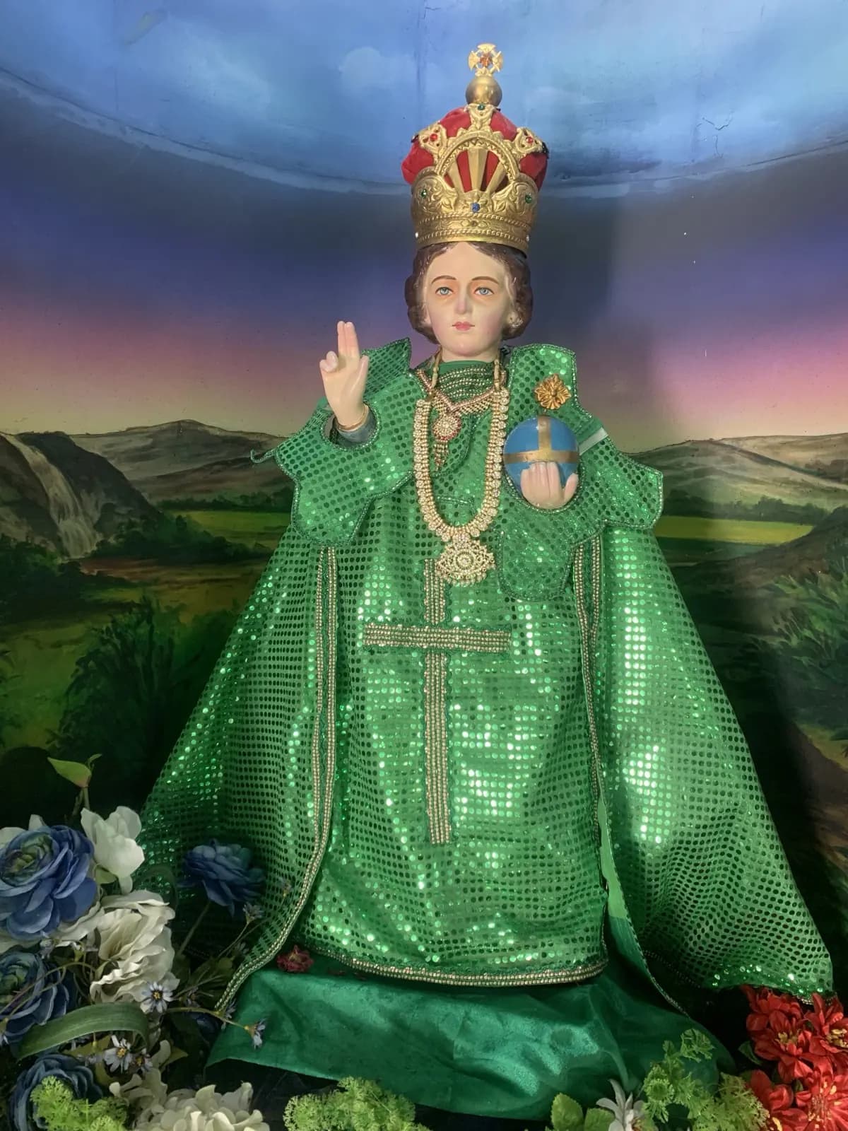 The Infant Jesus in green vestments