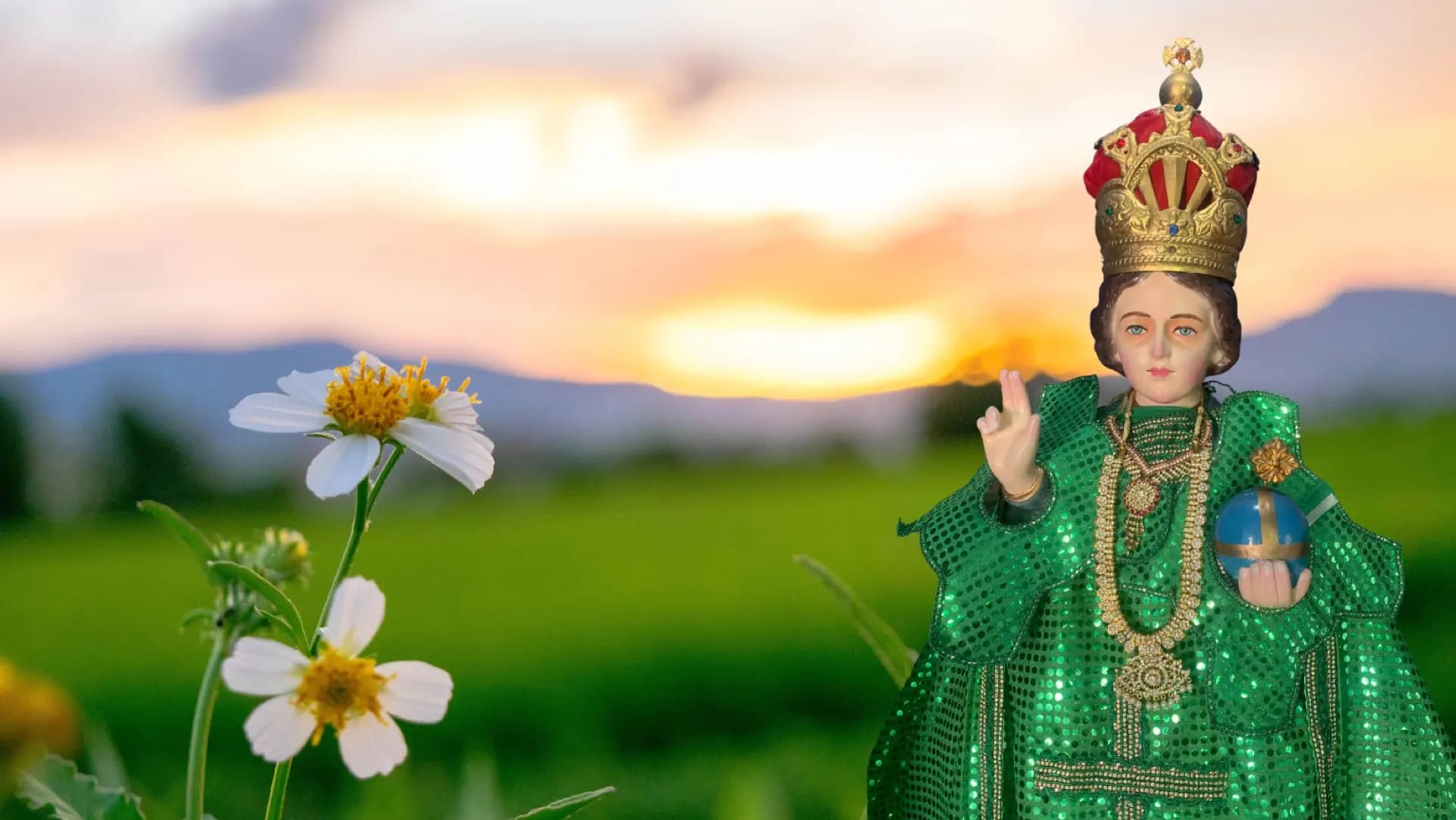 The Miraculous Infant Jesus over the sunset meadows