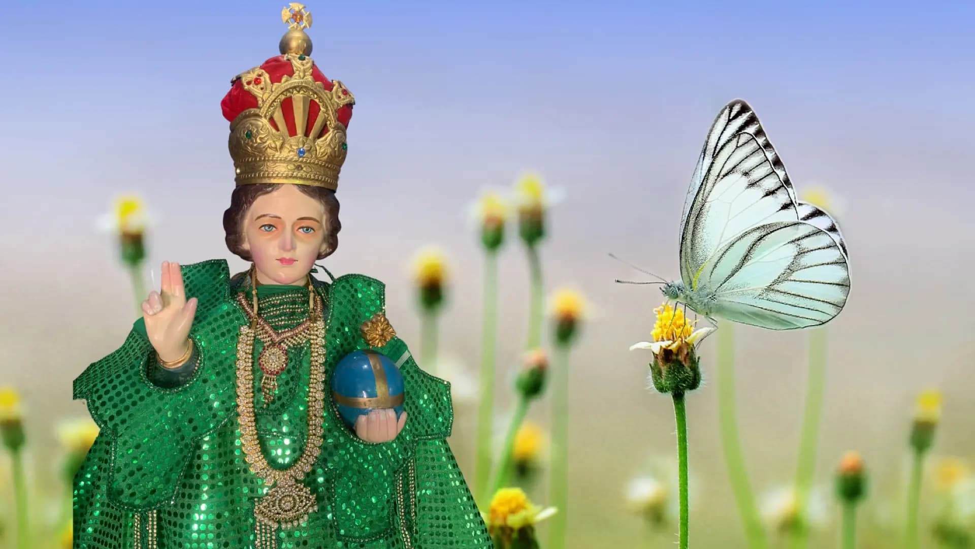 The Infant Jesus amid wildflowers and a butterfly